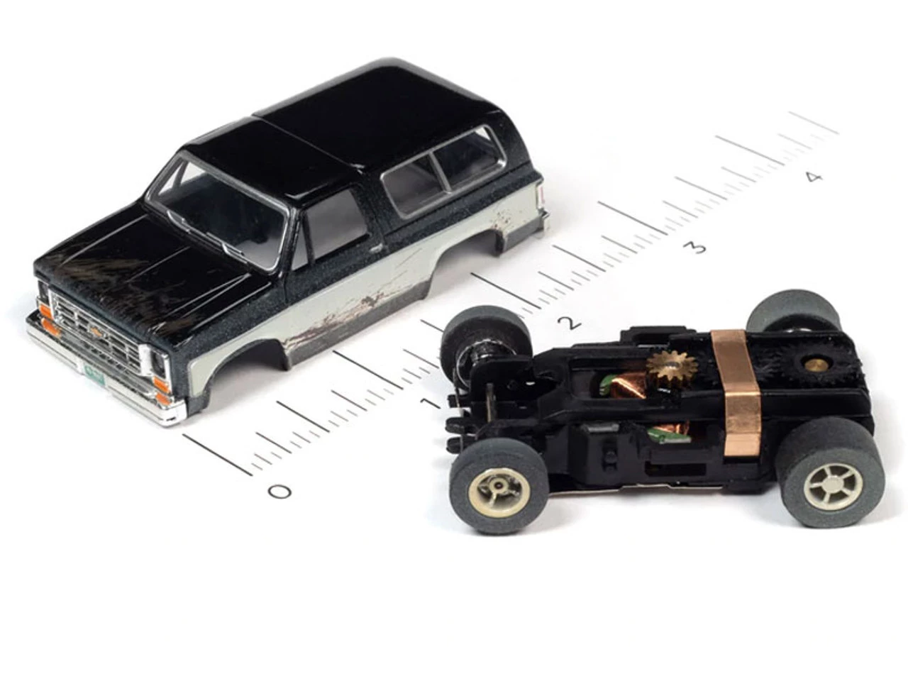 Auto World 1977 Chevrolet Blazer (Black/White) X-Traction R1 HO Slot Car - Image 3