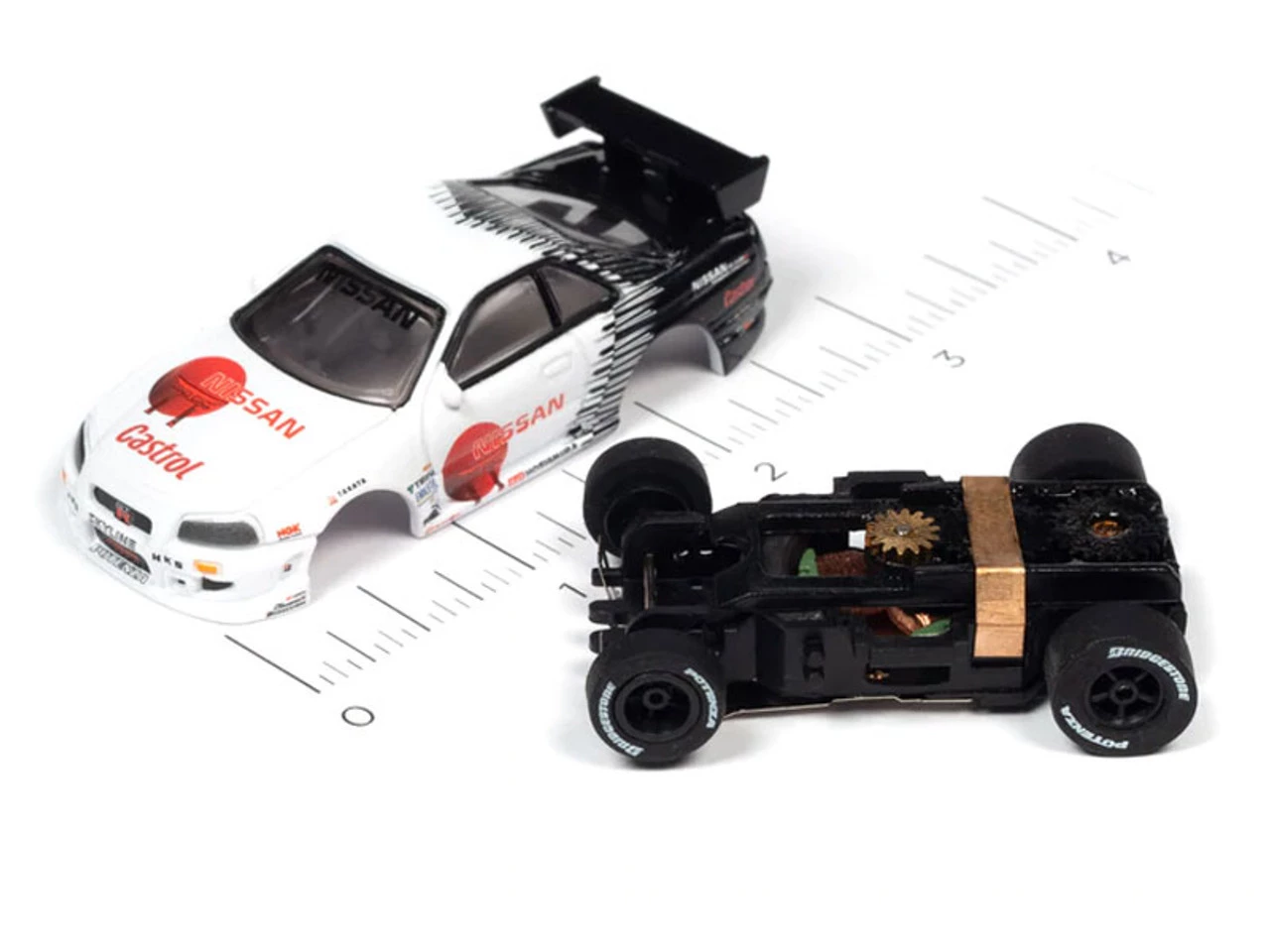 Auto World 1999 Nissan Skyline GT-R (White/Black) Import Heat X-Traction HO Slot Car - Image 3